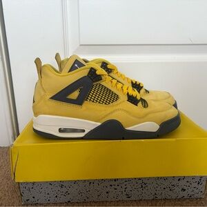 Air Jordan 4 Retro.  Size 9.  Used but in great shape.